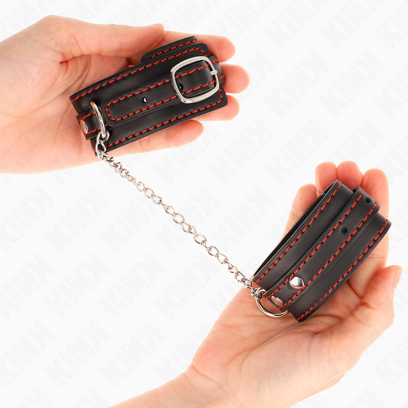 KINK – PETITES RETENUES-POIGNETS NOIRES AVEC DOUBLURE ROUGE RÉGLABLE 14-24 CM X 3,5 CM